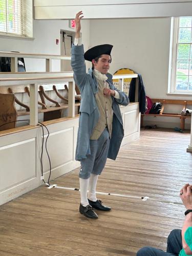 Lane Norris rehearses Patrick Henry's famous "Give me liberty or give me death!" speech at the Benstitute, a training program for historic interpreters and storytellers.