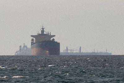 FILE PHOTO: Cargo ships in the Gulf, near the Strait of Hormuz (copy)