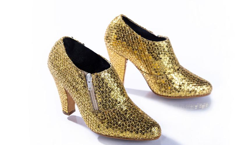 Prince wore these gold metallic shoes during his 2010-2011 Welcome 2 America Tour.