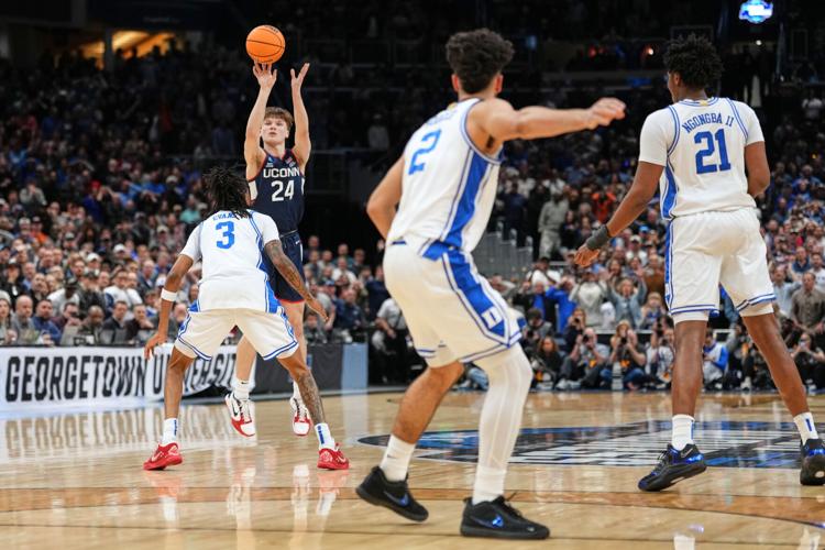 APTOPIX NCAA UConn Duke Basketball