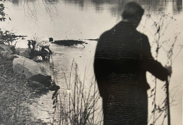 Detectives at the James River where Christopher Harper's body was found