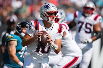 Drake Maye of the New England Patriots scrambles against the Jacksonville Jaguars during the fourth quarter at EverBank Stadium on Sunday, Sept. 27, 2026, in Jacksonville, Fla..