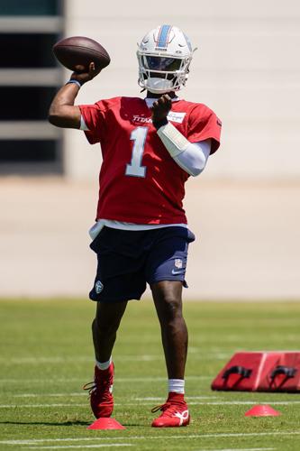 Tennessee Titans quarterback Cam Ward (1) throws the ball during mandatory minicamp at Vanderbilt Health Football Center in