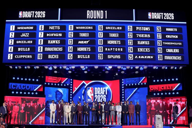 Jun 23, 2026; New York, NY, USA; NBA commissioner Adam Silver under the board showing the 2026 NBA draft first round results at Barclays Center. Mandatory Credit: Brad Penner-Imagn Images