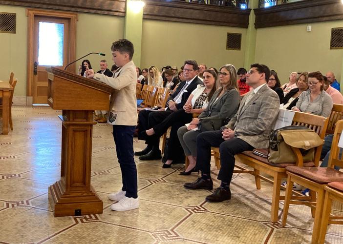 Samuel Menges, a 12-year-old from Lorain County in northeast Ohio, speaks June 1 in front of the Ohio legislature's Select