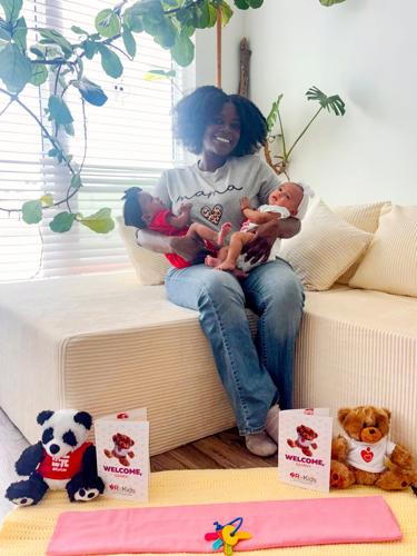 Mercedesz Brown, 34, of Detroit, with her 2-month-old twin girls, Sanaa, left, and Saanvi.