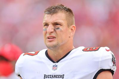 Tampa Bay Buccaneers tight end Rob Gronkowski looks on against the Philadelphia Eagles in the NFC wild-card playoff game at Raymond James Stadium on Jan. 16, 2022, in Tampa, Florida.