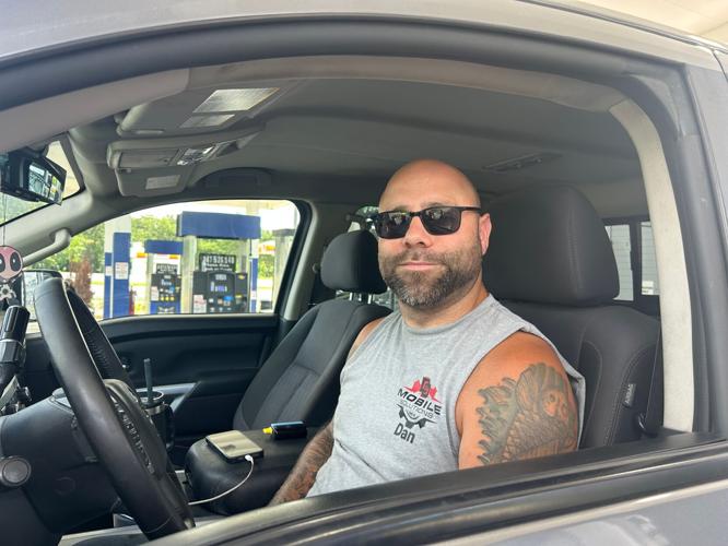 Dan Soboloski uses his Dodge truck for work as a traveling mechanic. He's had to add in fuel surcharges for some jobs.