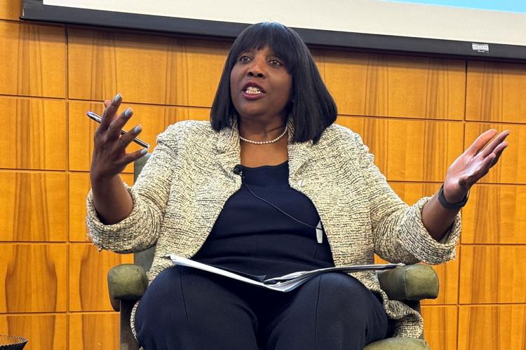 Federal Reserve Governor Lisa Cook speaks at the Stanford Institute of Economic Policy Research in Palo Alto