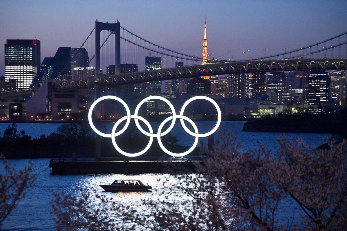 A boat sails past the 2020 Olympic Rings on March 25, 2020, in Tokyo, Japan.