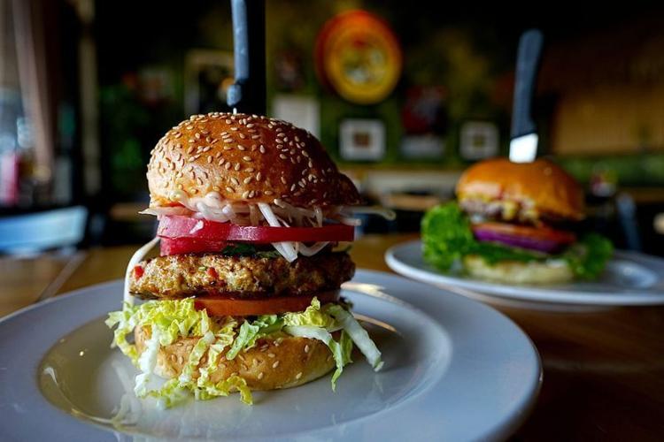 The Buddha Burger, left, and Grill-A-Burger Deluxe Cheeseburger from Grill-A-Burger in Palm Desert, Calif., on Tuesday, May 5, 2026.