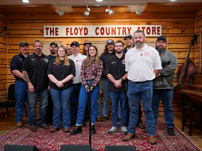 Morgan Wade and firefighters bw by Rick Krajnyak.png