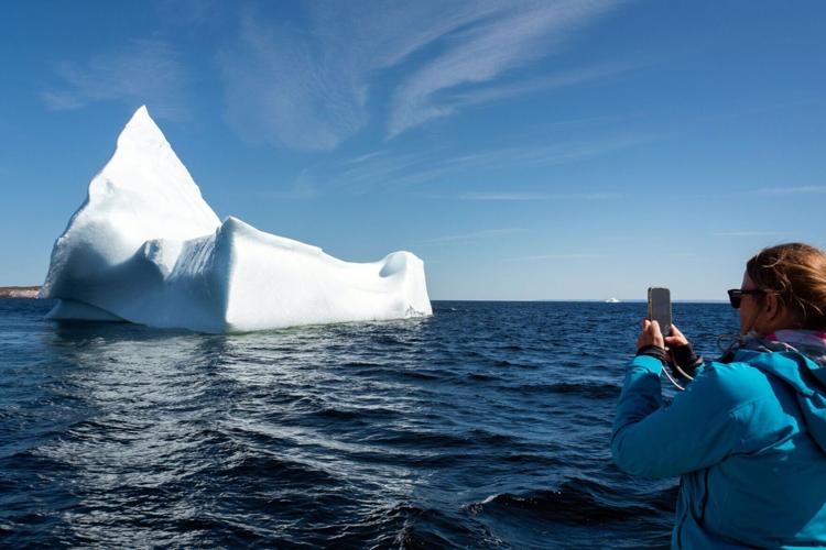 Icebergs drift to east Canada from Greenland. Tourists can see them by boat.