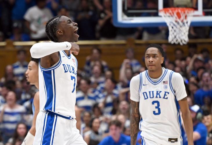 Duke Blue Devils forward Dame Sarr (7) reacts during a timeout in the second half against the North Carolina Tar Heels at Cameron Indoor Stadium. The Duke Blue Devils won 76-61.