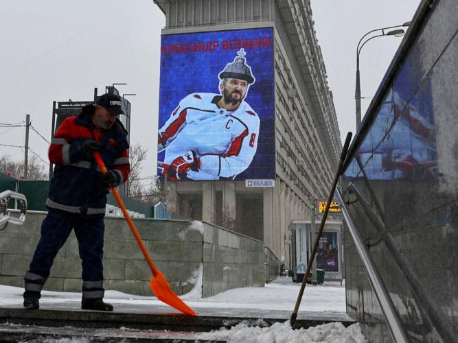 FILE PHOTO: Alex Ovechkin is seen on a screen in celebration of his 895th career National Hockey League goal, in Moscow