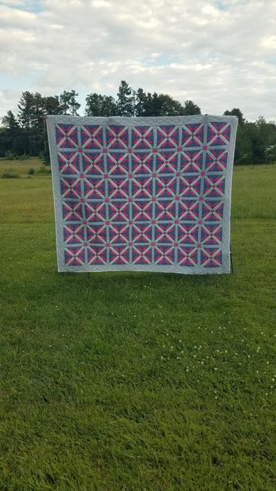 'Star and Cross' quilt by Uldine Duncan