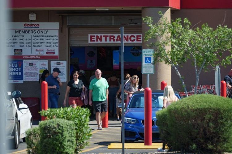 People enter and exit the Costco location on North Hayden Road, photographed on April 7, 2026, in Scottsdale, Ariz.
