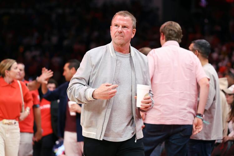 Apr 24, 2026; Houston, Texas, USA; Houston Rockets owner Tilman Fertitta walks on the court during the fourth quarter against the Los Angeles Lakers during game three of the first round of the 2026 NBA Playoffs at Toyota Center. Mandatory Credit: Troy Taor