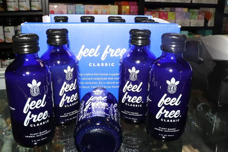 Kratom“ Feel Free Classic” liquid products are displayed at a smoke shop in Los Angeles in 2024 before they were banned.