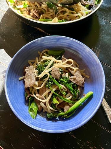 Stir-fried Rice Noodles with Beef and Broccoli.