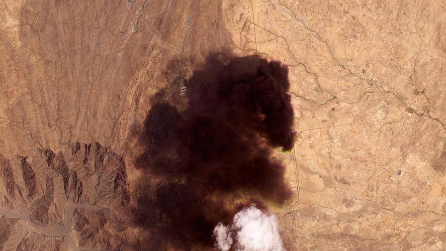 A satellite image shows smoke rising from the Saudi Aramco oil depot in Abha Bulk