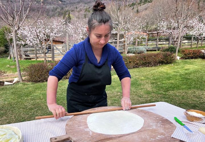 Anita Cota rolls out filo pastry at Karaiskos farm in Portaria.