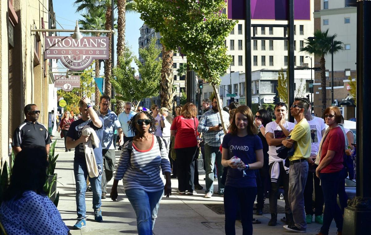 Supporters of Hillary Clinton wait in line to enter Vroman's Bookstore in Pasadena, California on Dec. 1, 2017, to get a signed copy of Clinton's book "What Happened."