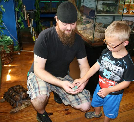 w-BI-Lucas Funk and blue iguana.jpg