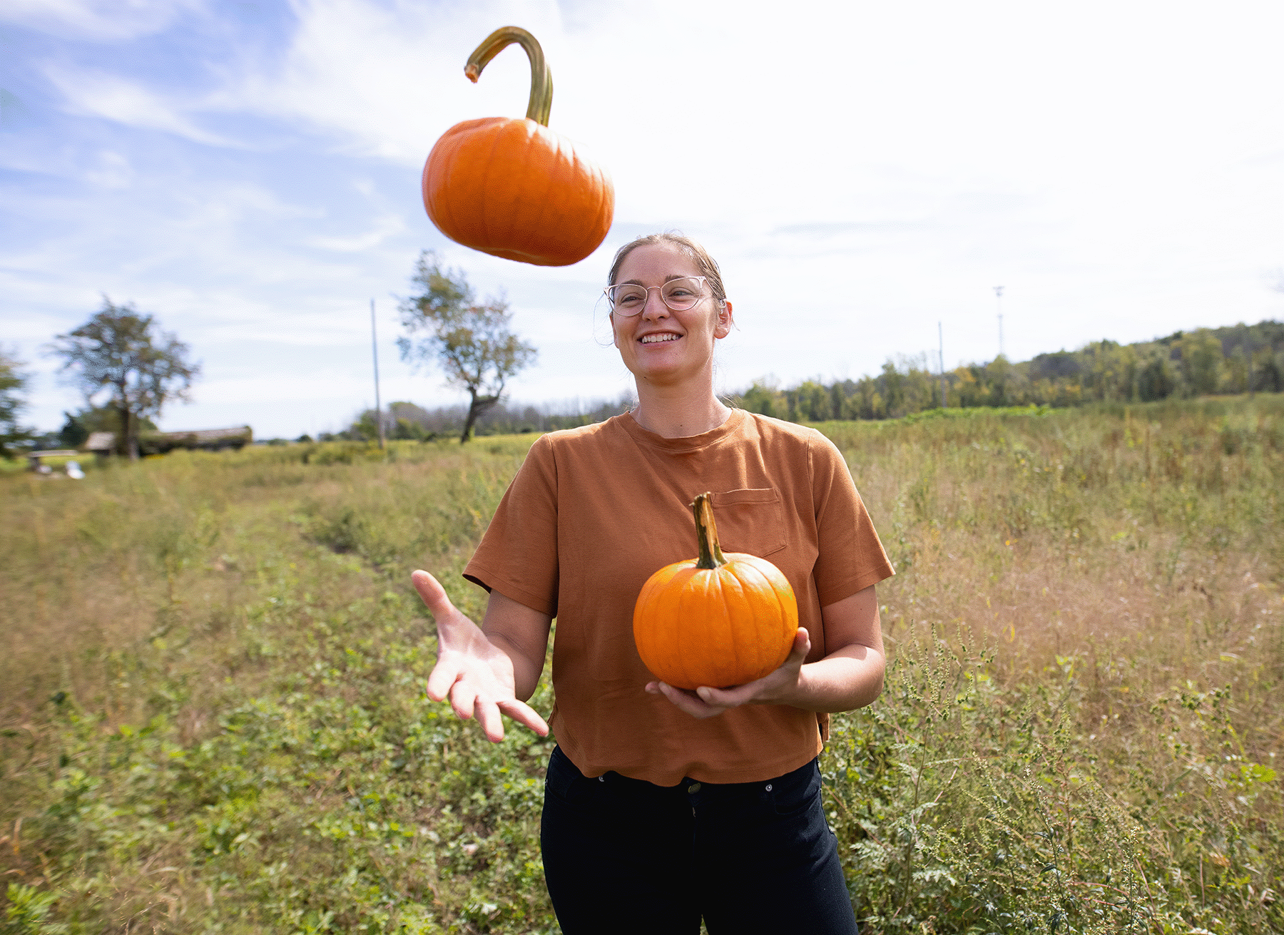 Ashley Pass, Assistant Manager, juggling pumpkins (no caption)