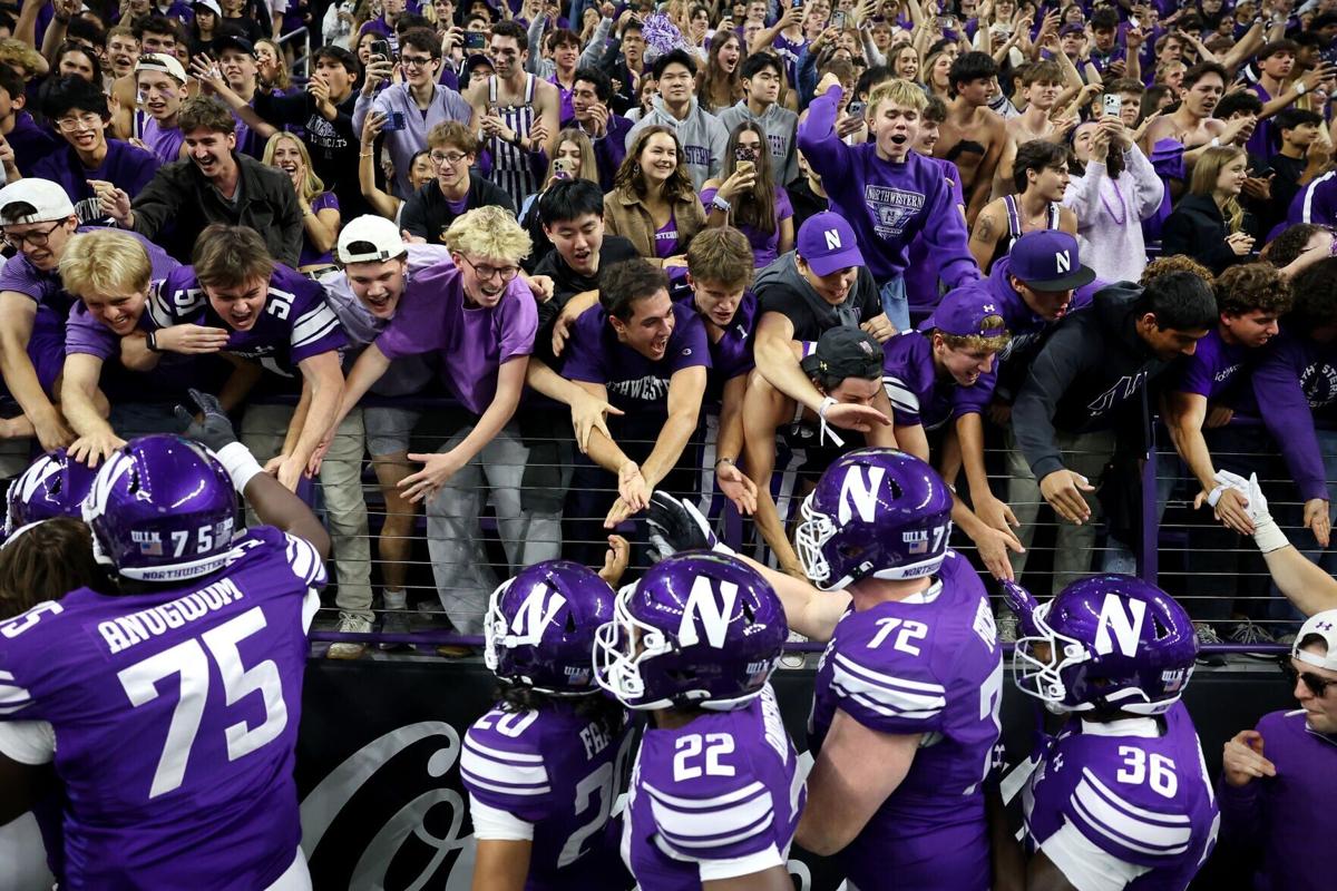 Northwestern players celebrate with the student section after a 34-13 victory against Penn State at the new Ryan Field on Oct. 2, 2026, in Evanston, Illinois.