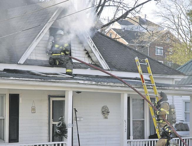 Marion, Adwolfe firefighters respond to Iron Street house fire