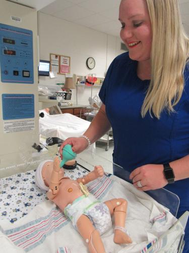 New Birthing Manikin Provides Lifelike Training for UA Little Rock Nursing  Students - News - UA Little Rock