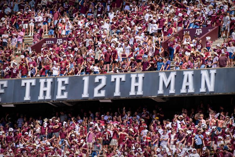 A view of the fans and students and the 12th man logo sign during the game between Texas A&M and New Mexico at Kyle Field on Sept. 18, 2021.