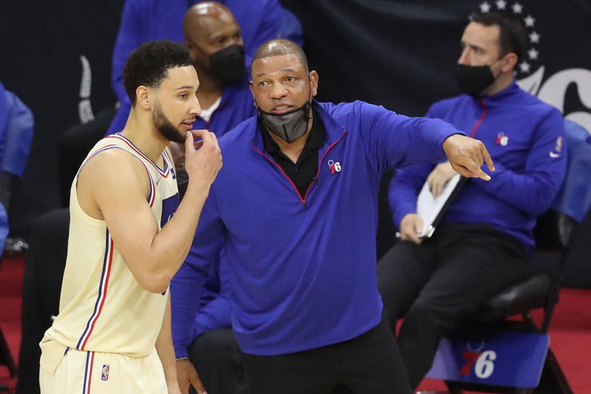 Philadelphia 76 ers head coach Doc Rivers gives instruction to Ben Simmons during a game last season.