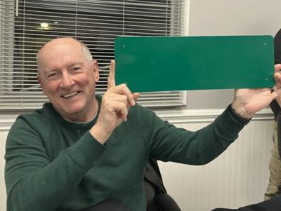 John Carter with train sign