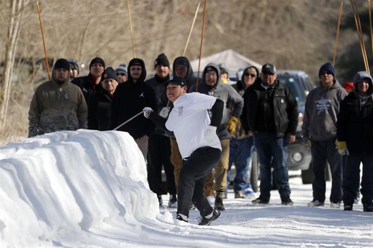 The ancient winter sport of snow snake