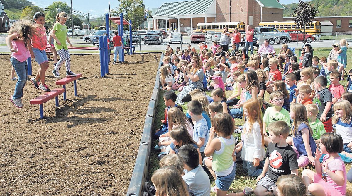 In photos & words New playground unveiled at Atkins Elementary School