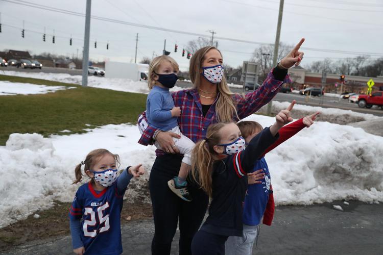 Andrea Bruzgul sees a billboard that was put up for her Andrea's husband, Jaron, a giant Bills fan, 41, who died in his sleep.