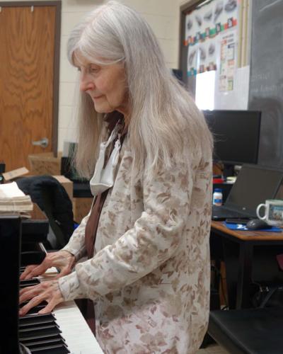 Smith playing piano