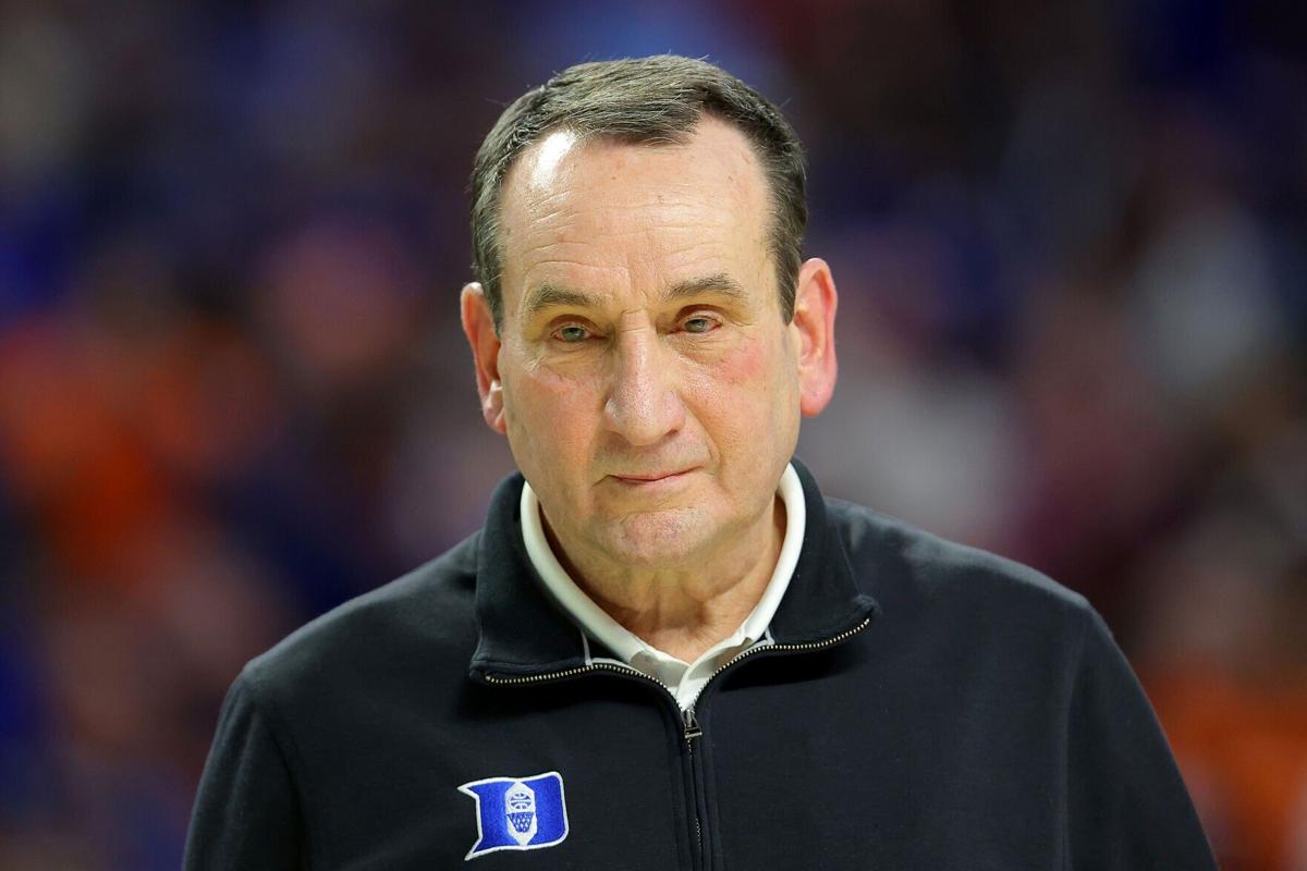 Duke head coach Mike Krzyzewski walks off the court after defeating Michigan State, 85-76 in the second round of the NCAA Tournament at Bon Secours Wellness Arena on March 20, 2022, in Greenville, South Carolina.