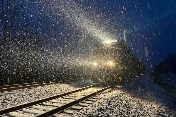 Snowfall on railroad tracks