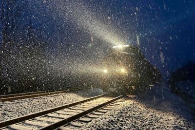 Snowfall on railroad tracks