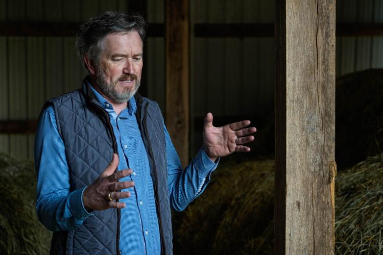 U.S. Rep. Thomas Massie stands among hay bales in a barn at his farm March 11 in Garrison, KY.