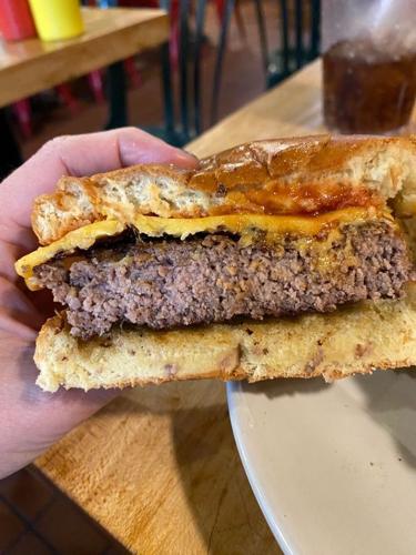 The inside of a "Joe Bartley" burger at Mr. Bartley's Burger Cottage in Cambridge.