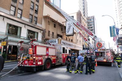 New York City firefighters respond to a fire in the Eugene O’ Neill Theatre, where "The Book of Mormon" performs, on Monday, May 4, 2026, in Manhattan, New York City.