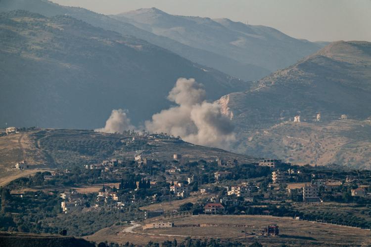 Smoke rises in southern Lebanon following an airstrike, near the border with Israel