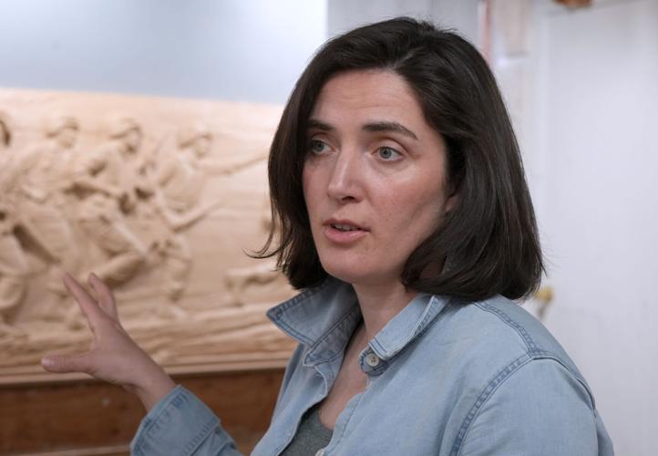 Emily Bedard, art director and lead scupltor for Foster Reeve, and artist behind the Desert Shield and Desert Storm Memorial, with her original clay creation of the memorial in her studio at the Garnerville Arts Center April 2, 2026.