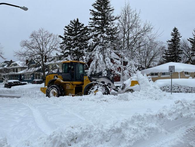 Front loader snow removal