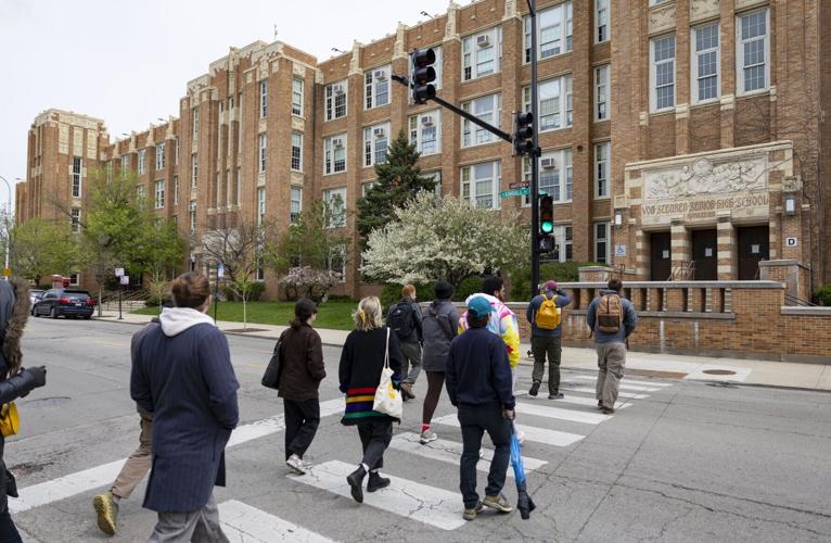 Will Quam leads one of his neighborhood brick tours to Von Steuben High School on Sunday, April 19, 2026, in Albany Park.