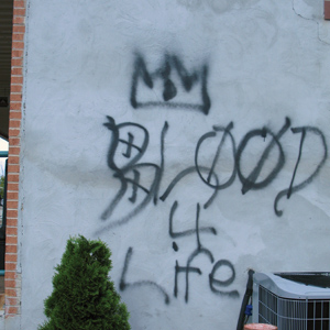 Gang graffiti spray-painted on town building | News | swvatoday.com